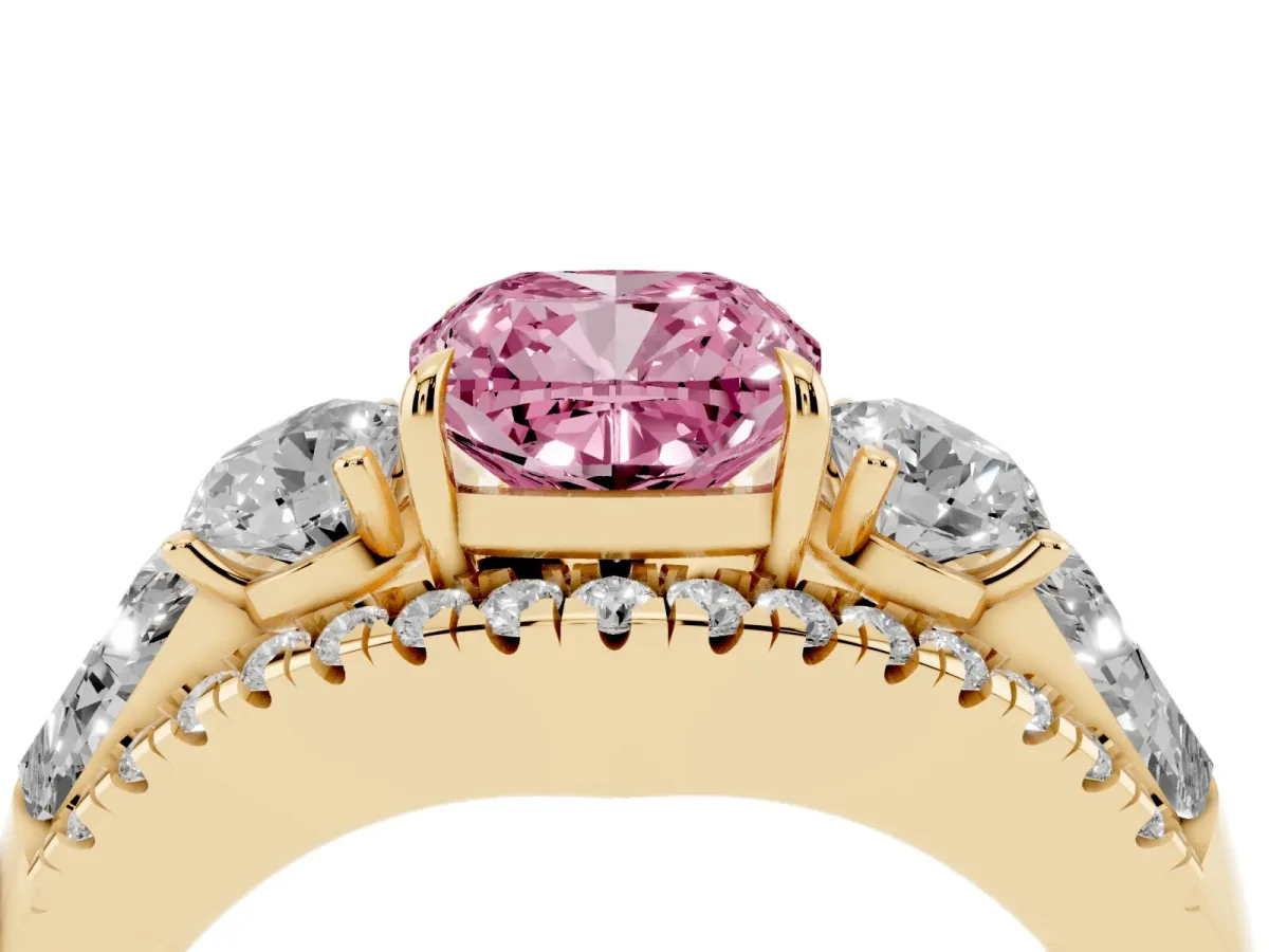 Fancy Pink Three-Stone Cushion Cut Diamond Engagement Ring with Pave Band and Prong Setting Yellow gold