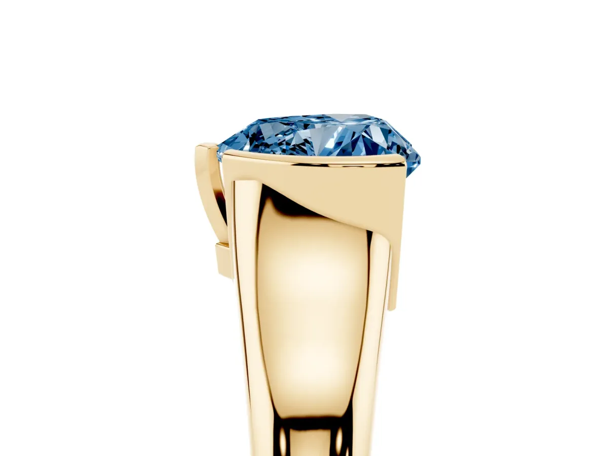 Fancy Blue Heart Cut Solitaire Tension Set Diamond Ring with Split Shank Band Yellow gold