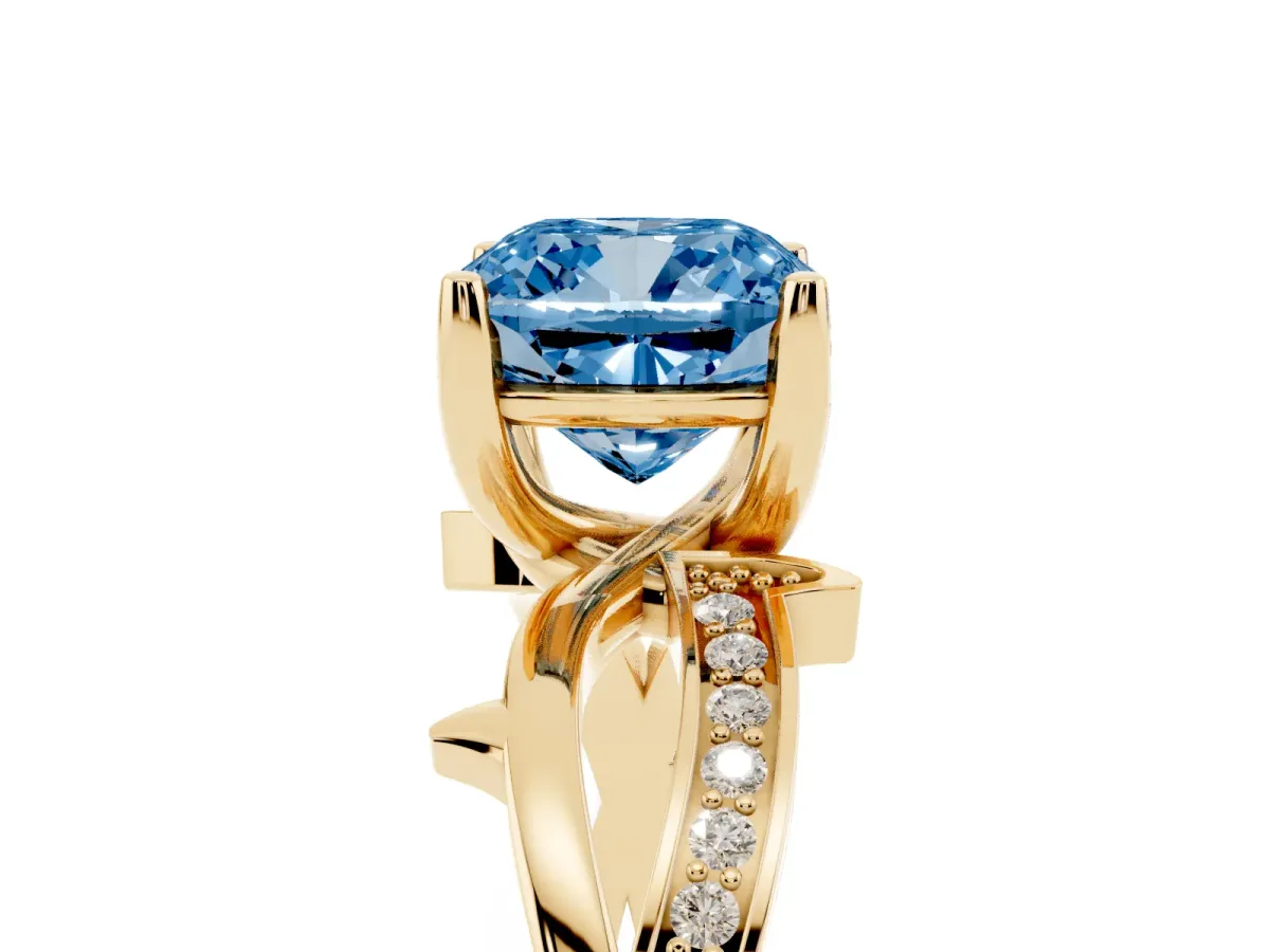 Fancy Blue Cushion Cut Solitaire Twist Band with Pavé Accents and Four-Prong Setting Yellow gold