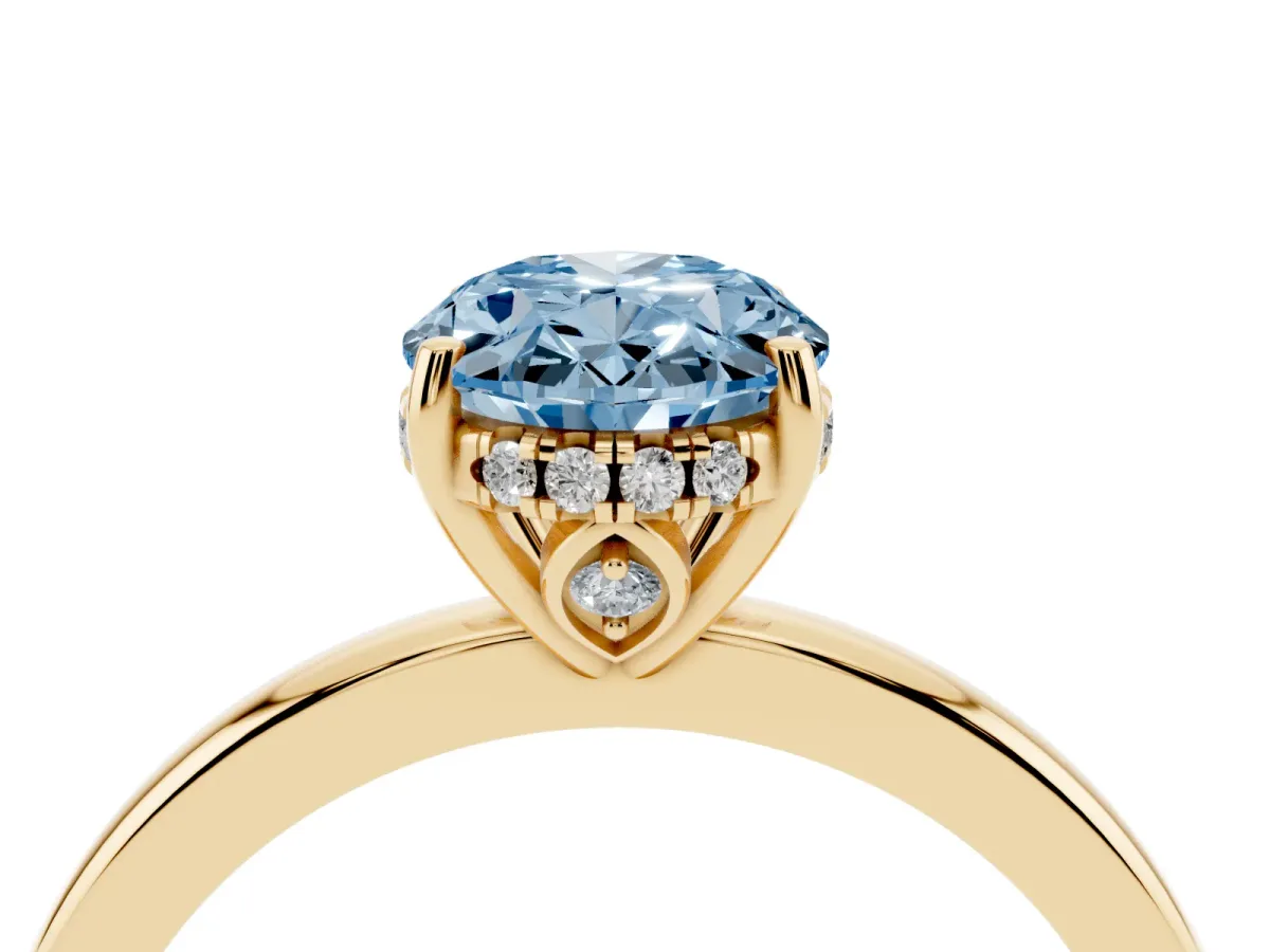 Fancy Blue Oval Cut Solitaire Diamond Ring with Prong Setting and Plain Band Yellow gold