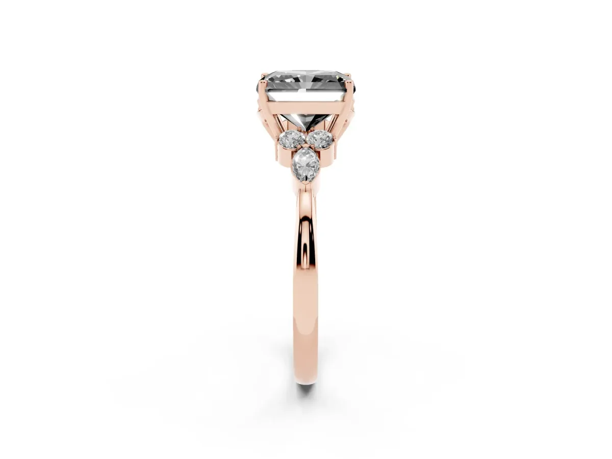 Fancy Black Radiant Cut Brilliant Diamond Solitaire Ring with Pear Side Stones and Four-Prong Setting Rose gold