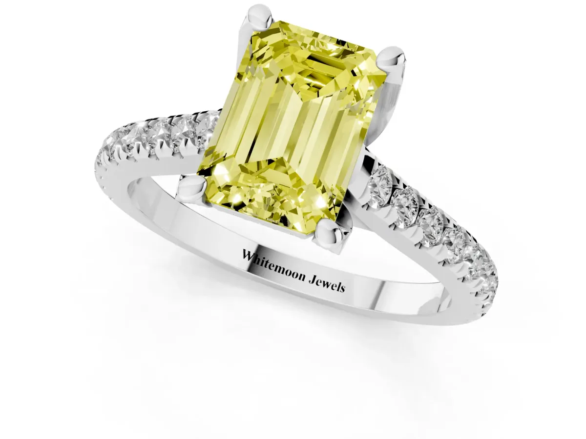 Fancy Yellow Emerald Cut Brilliant Diamond Solitaire with Pavé Band and Four-Prong Setting Platinum