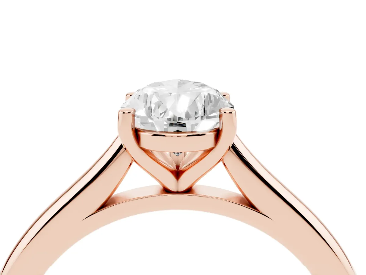 Pear Cut Cut Solitaire Ring with Cathedral Band and Four-Prong Setting Rose gold