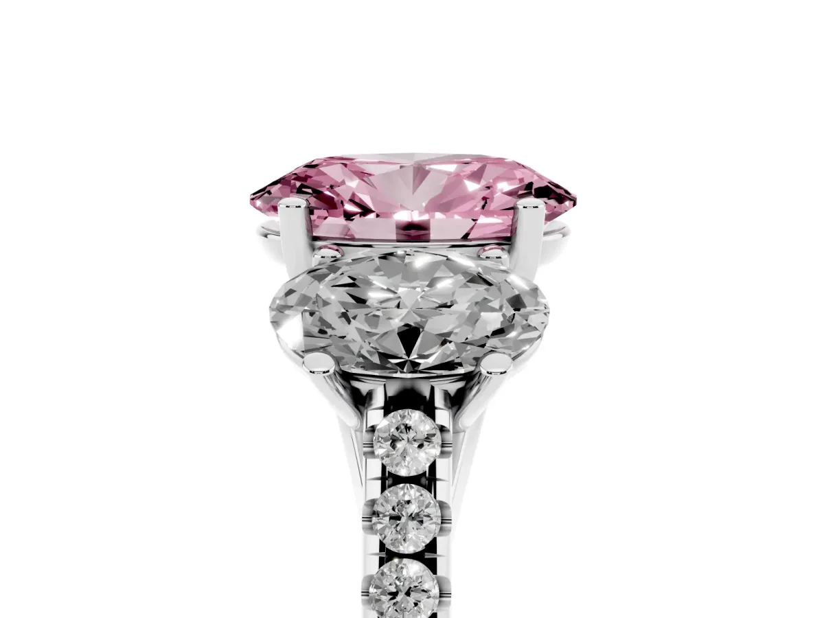 Fancy Pink Three-Stone Oval Cut Diamond Ring with Round Pavé Band and Prong Setting Silver