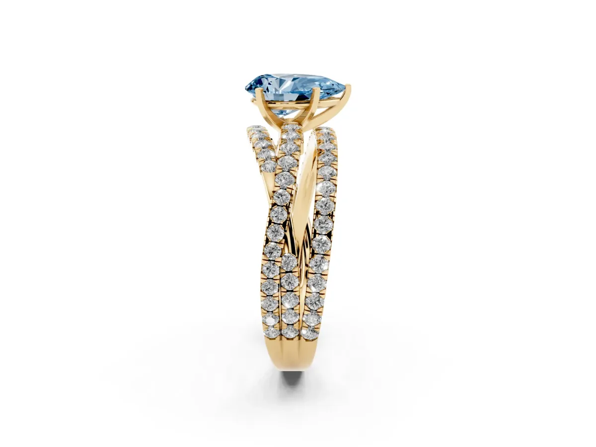Fancy Blue Pear Cut Solitaire Twist Band with Pavé Setting and Four-Prong Setting Yellow gold