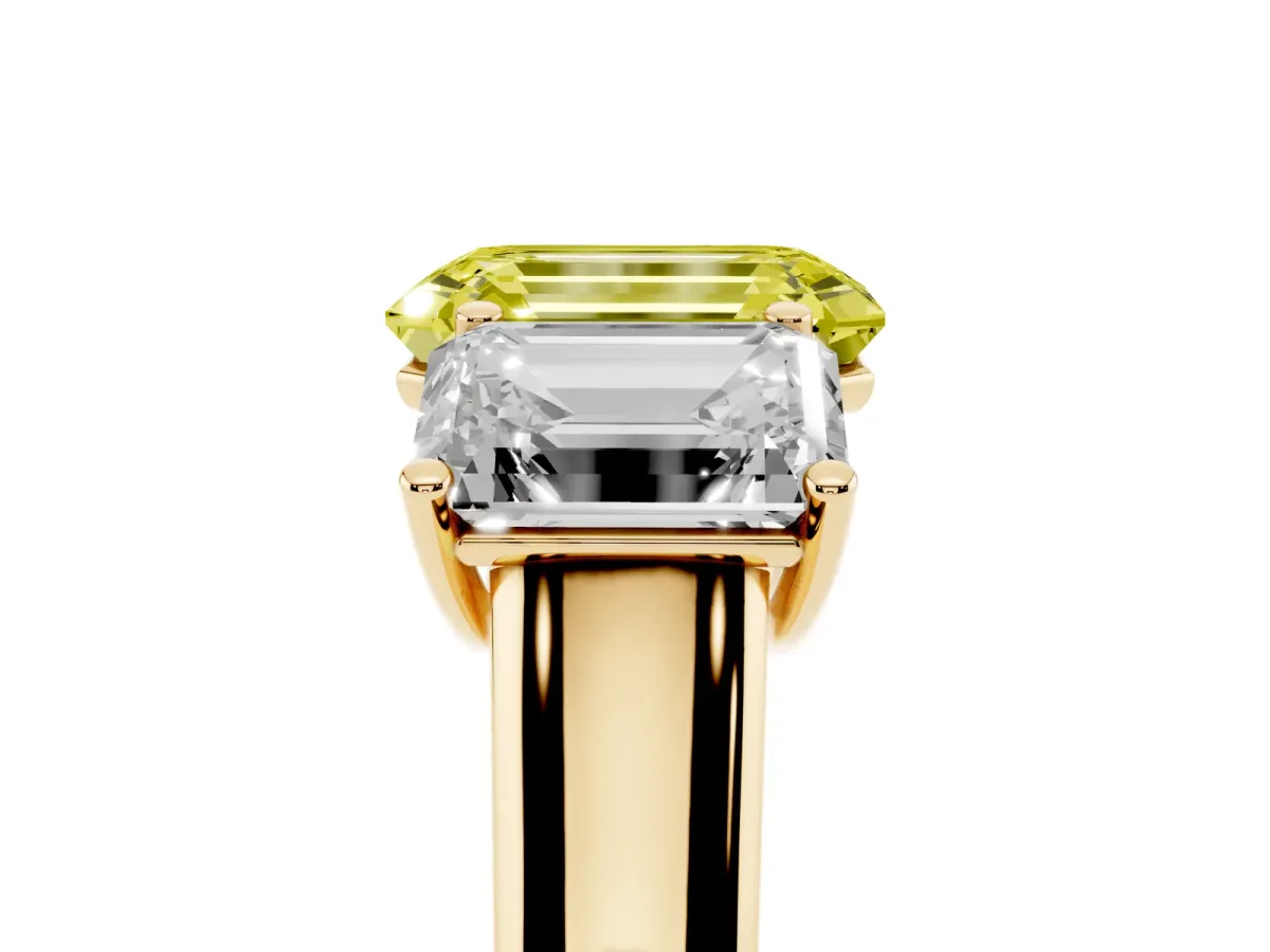 Fancy Yellow Emerald Cut Three-Stone Diamond Ring with Prong Setting on a Classic Band Yellow gold