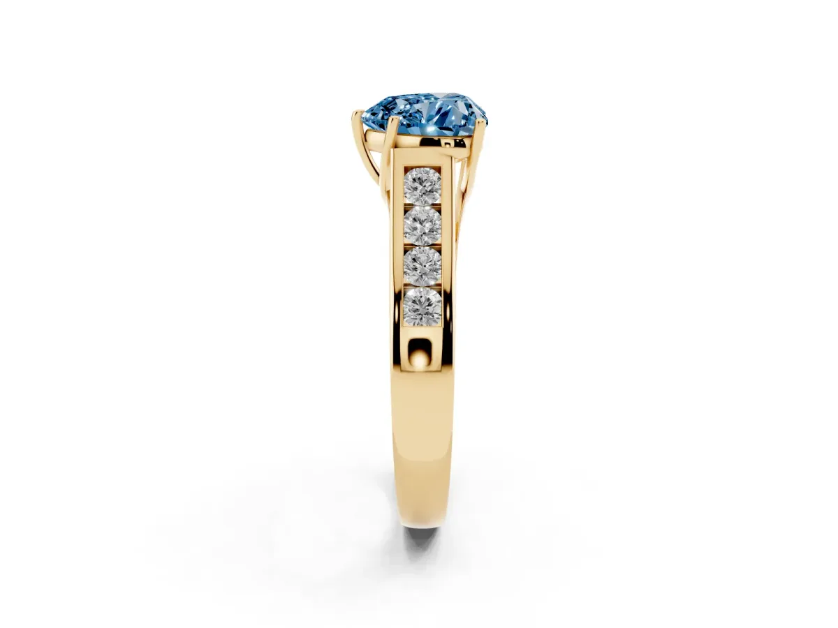 Fancy Blue Heart Cut Brilliant Channel-Set Solitaire Ring with Four-Prong Setting Yellow gold