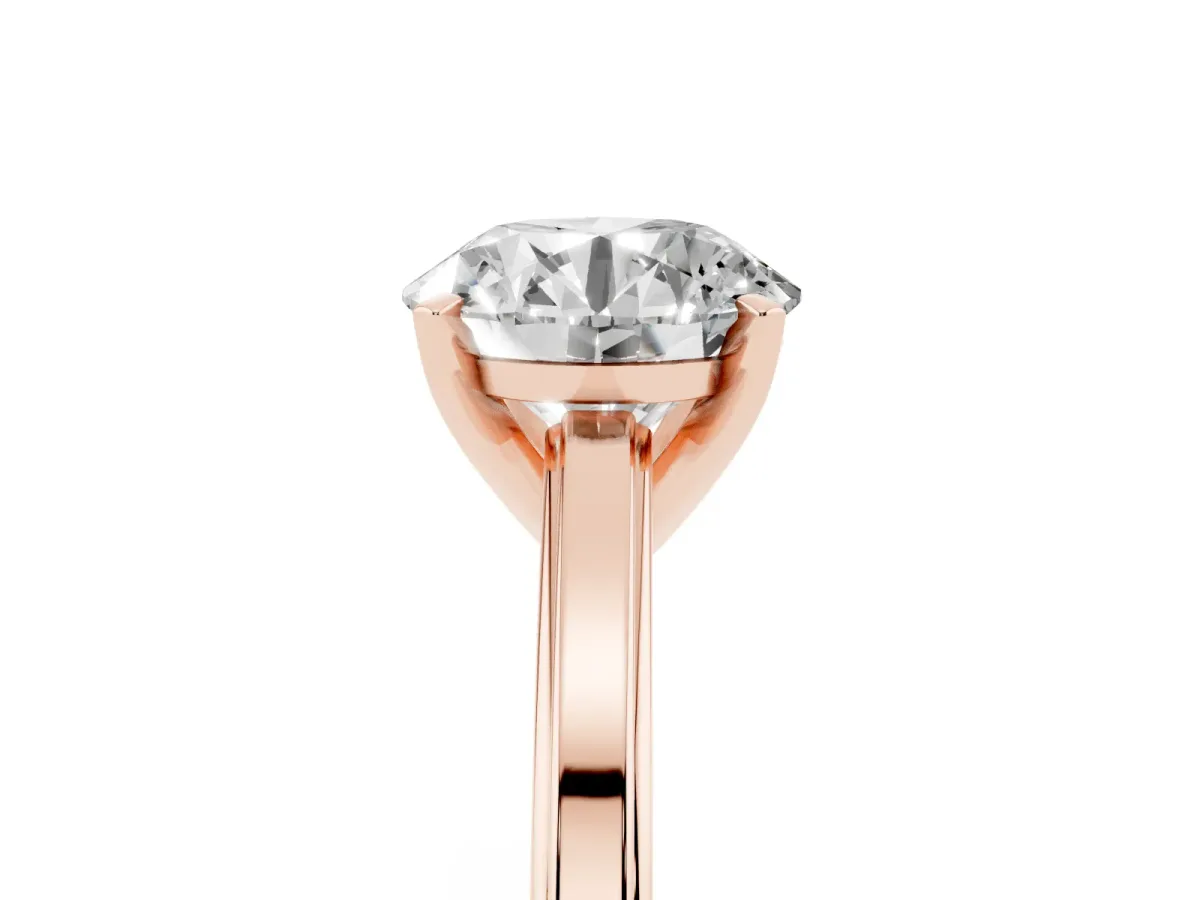Round Cut Solitaire Diamond Ring with Four-Prong Setting and Classic Band Rose gold