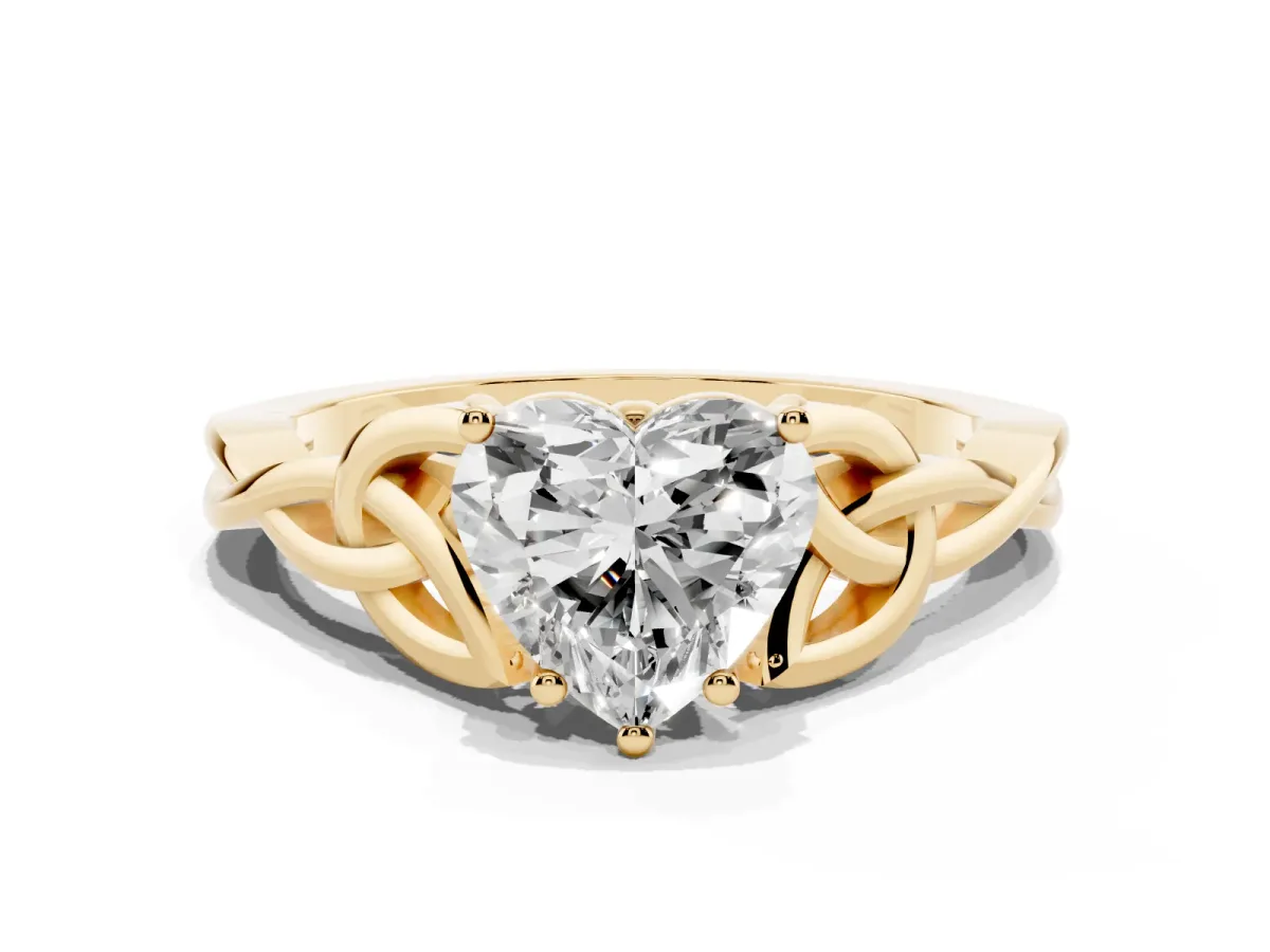 Heart Cut Diamond Solitaire Engagement Ring with Celtic Knot Band and Four-Prong Setting Yellow gold