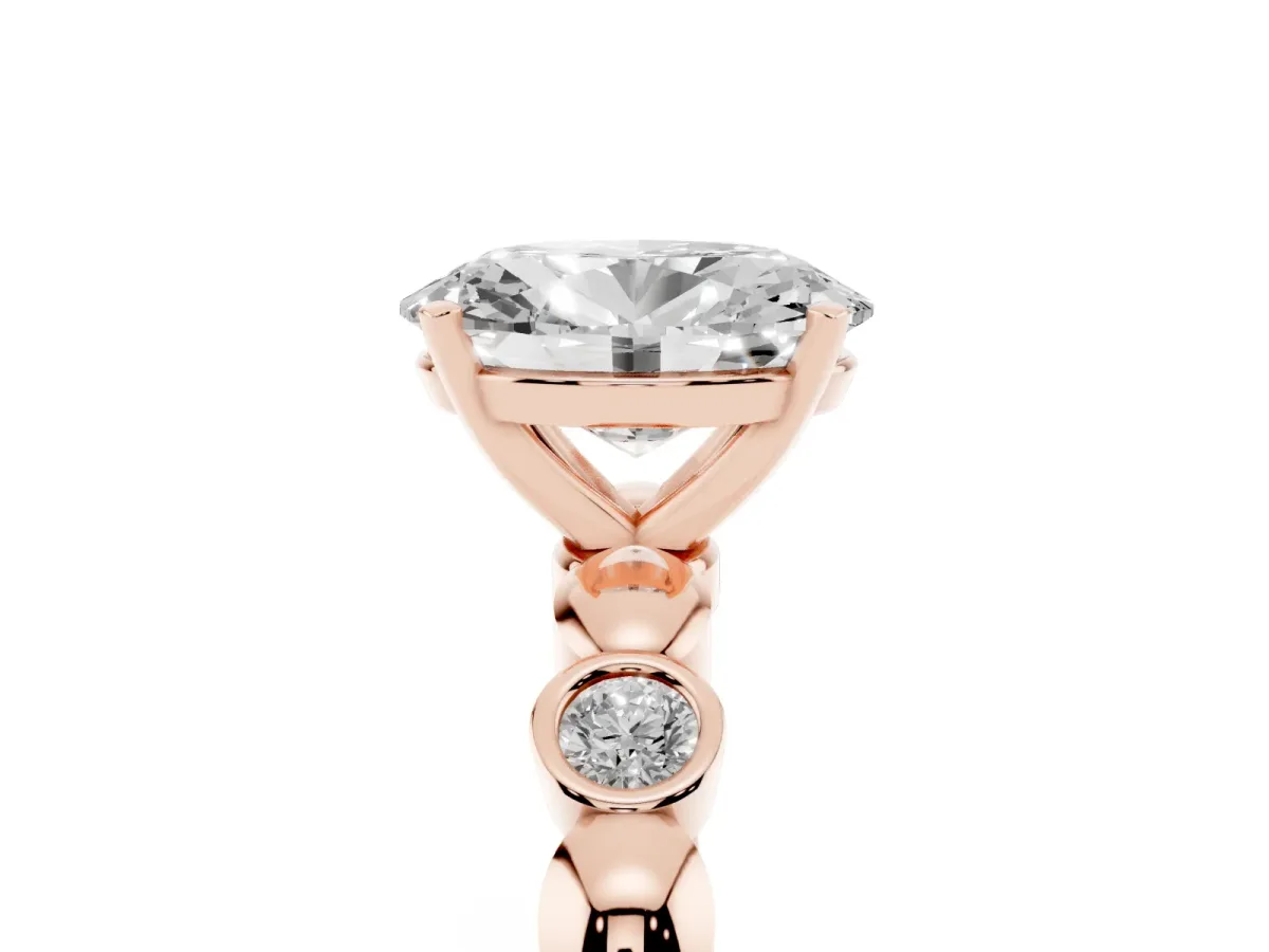Oval Cut Solitaire Bezel-Set Diamond Ring with Beaded Band and Four-Prong Setting Rose gold