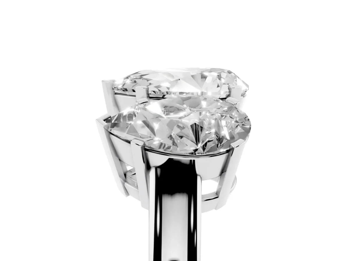 Three-Stone Pear Cut Cut Diamond Ring with Channel Set Band and Four-Prong Setting Platinum