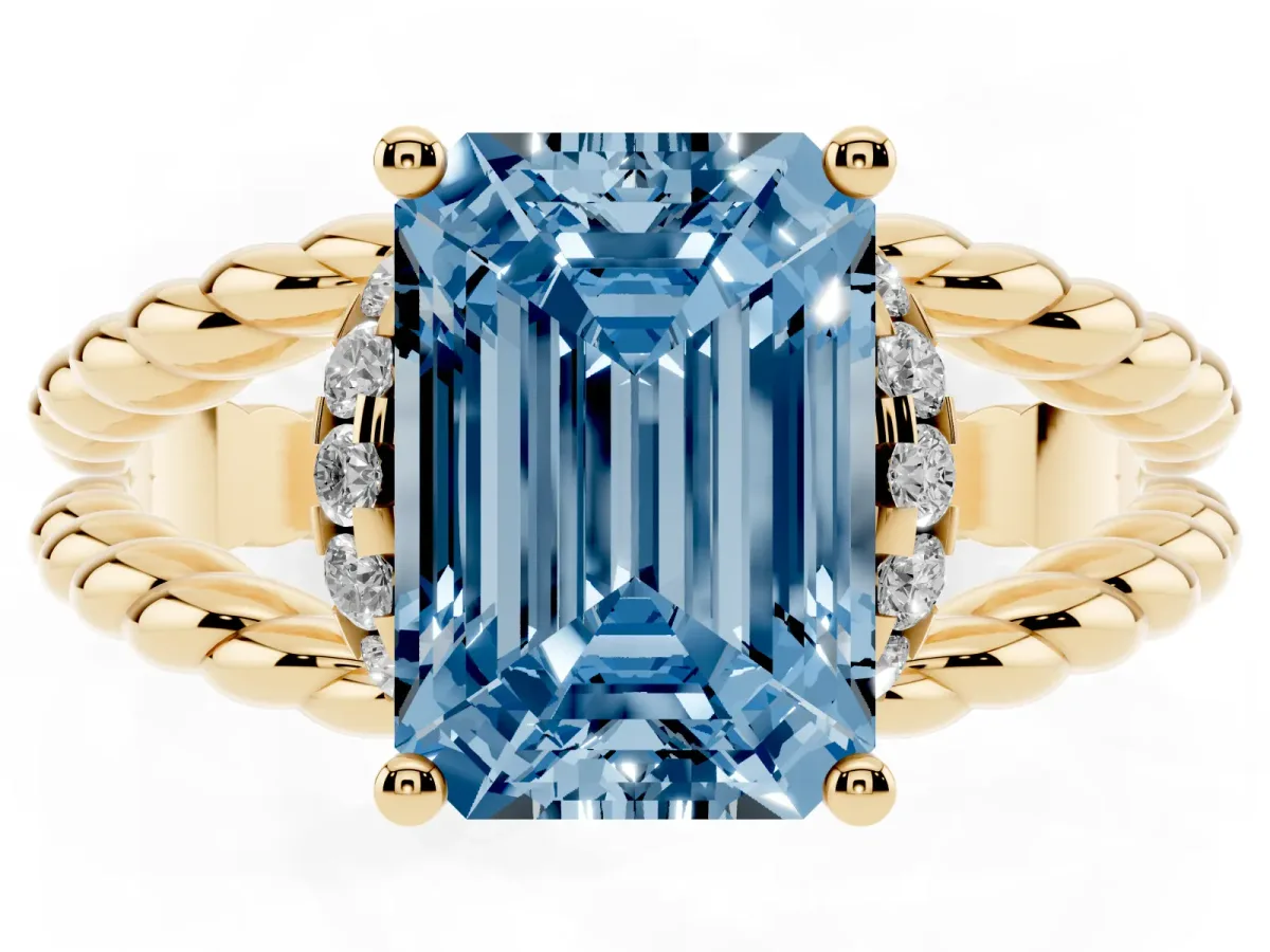 Fancy Blue Emerald Cut Halo Twisted Band Four-Prong Ring Yellow gold