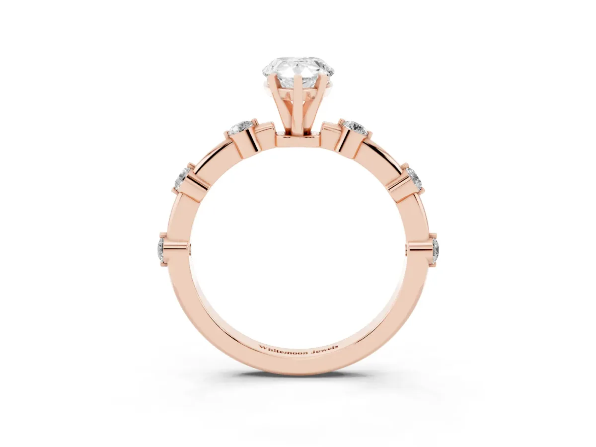 Pear Cut Solitaire Diamond Ring with Bezel Set Side Stones and Prong Setting Rose gold