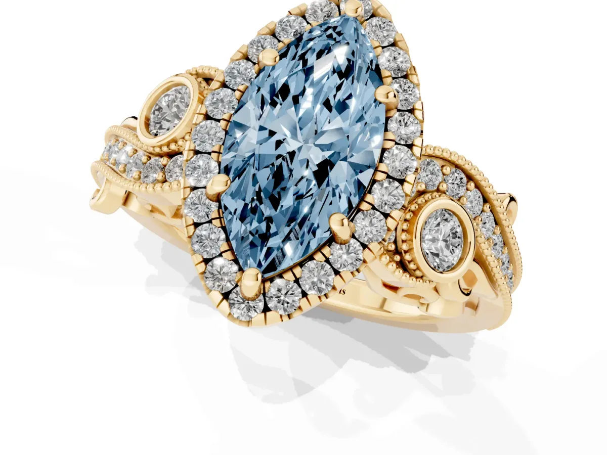 Fancy Blue Marquise Cut Halo Diamond Ring with Milgrain and Bezel Accents on a Split Shank Band Yellow gold