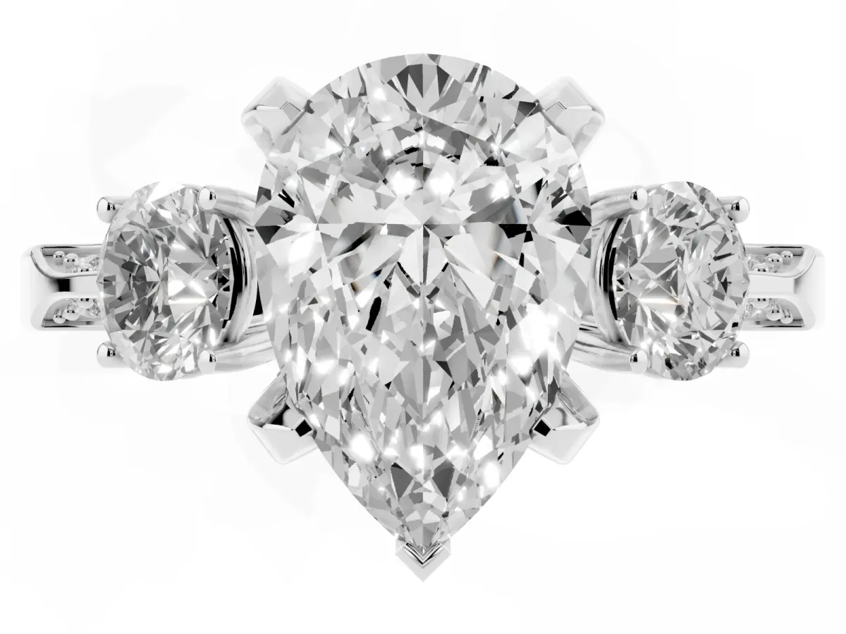 Pear Cut Brilliant Three-Stone Diamond Ring with Pavé Band and Four-Prong Setting Silver