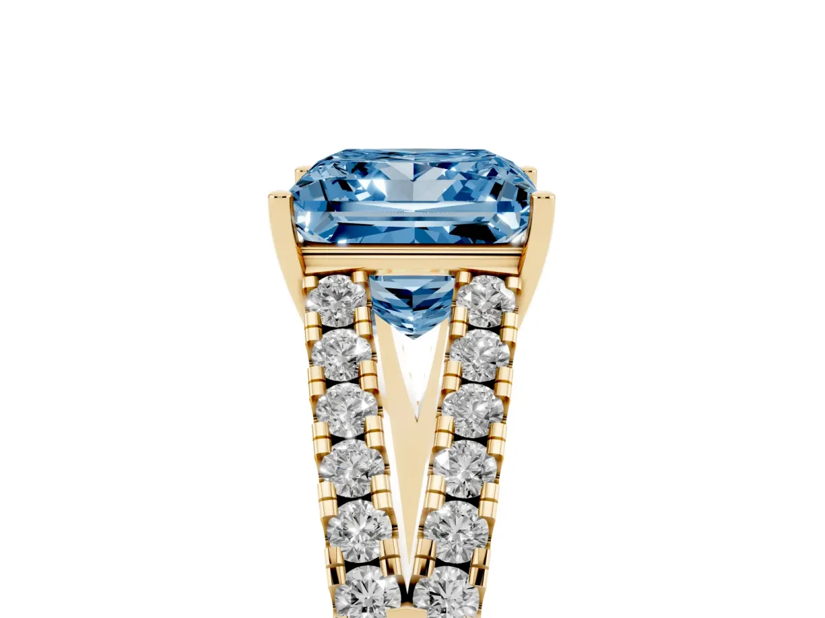 Fancy Blue Princess Cut Diamond Split Shank Pavé Engagement Ring with Four-Prong Setting Yellow gold