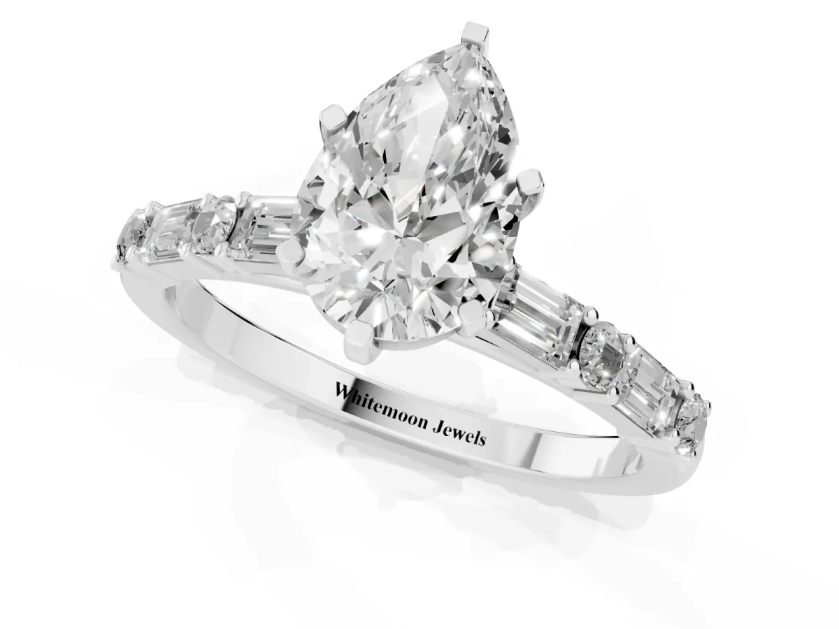 Pear Cut Diamond Solitaire with Side Baguettes and Channel Set Band Platinum