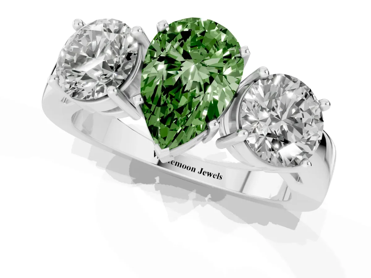 Fancy Green Three-Stone Pear Cut Diamond Ring with Round Side Stones, Classic Band, and Four-Prong Setting Platinum