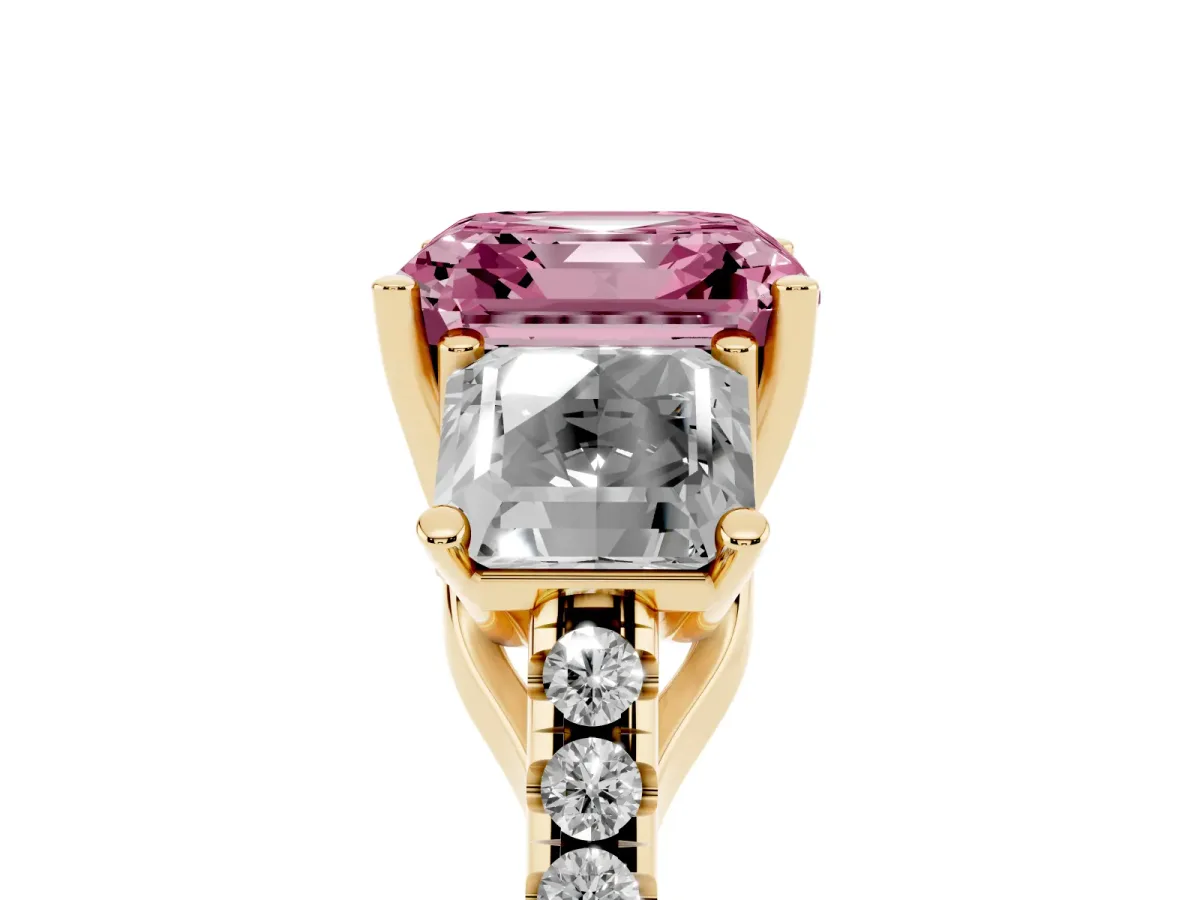 Fancy Pink Three-Stone Asscher Cut Diamond Ring with Round Pavé Band and Prong Setting Yellow gold