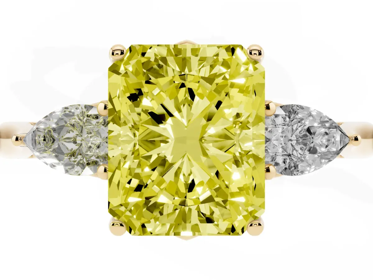 Fancy Yellow Three-Stone Radiant Cut Diamond Ring with Pear Side Stones in Four-Prong Setting Yellow gold