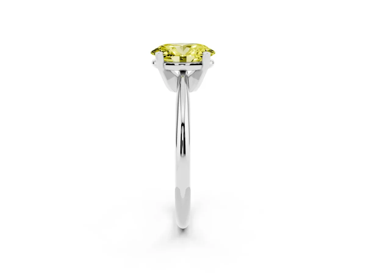 Fancy Yellow Oval Cut Cut Solitaire Ring with Four-Prong Setting on a Classic Band Platinum