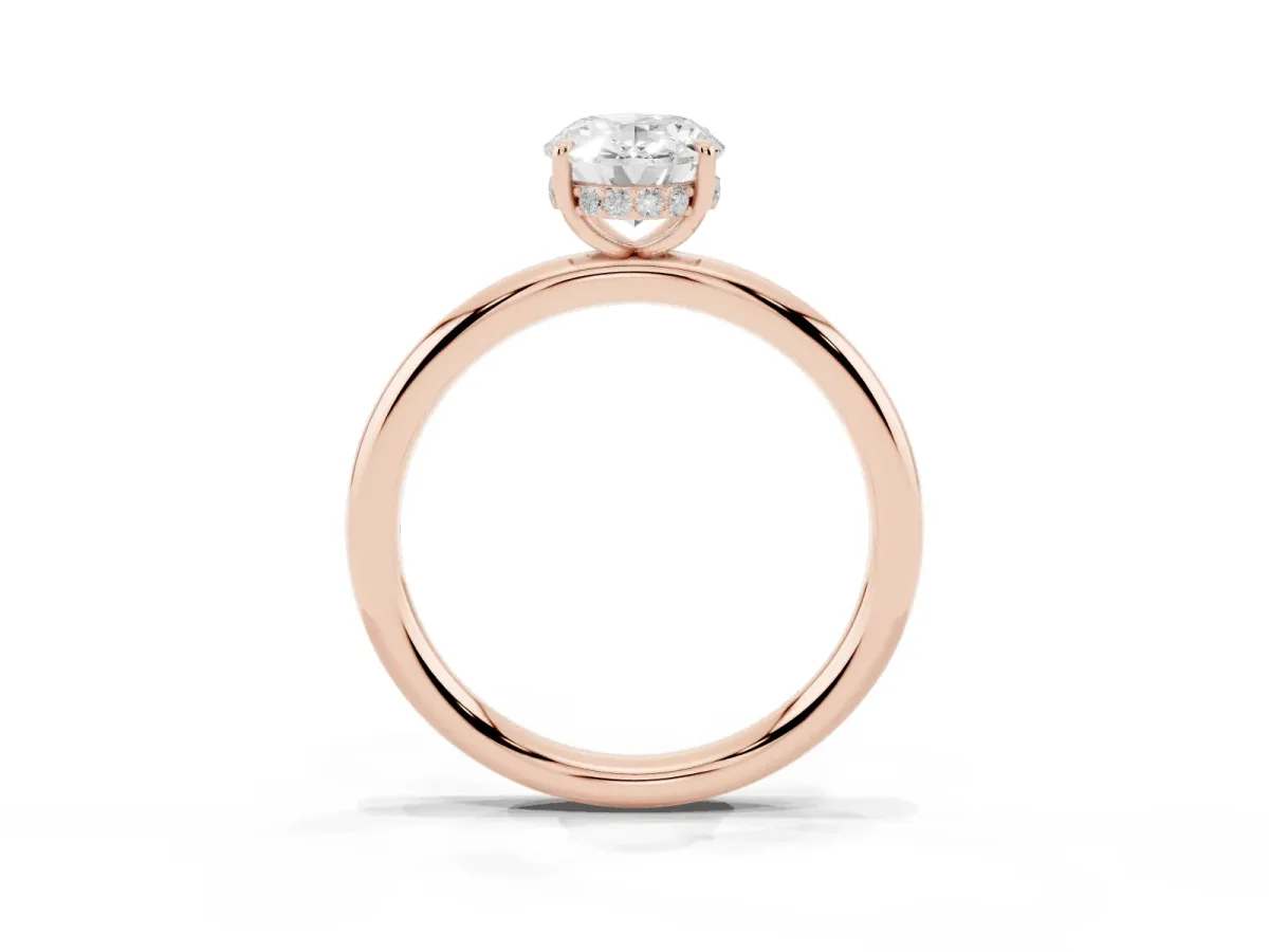 Oval Cut Diamond Solitaire Ring with Thin Band and Four-Prong Setting Rose gold