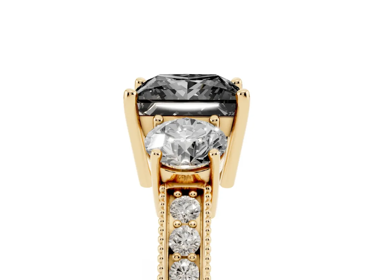 Fancy Black Princess Cut Three-Stone Diamond Ring with Pavé Band and Four-Prong Setting Yellow gold