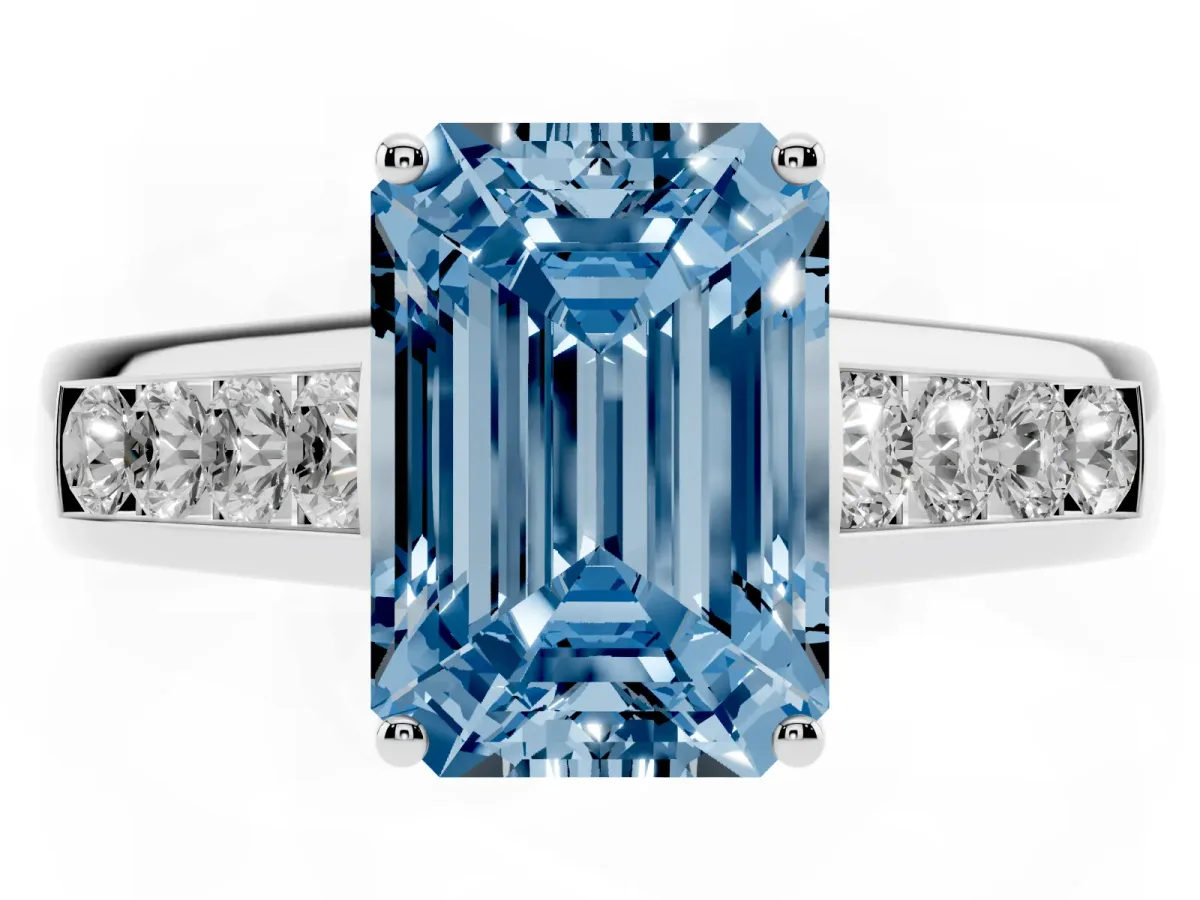 Fancy Blue Emerald Cut Solitaire Channel-Set Diamond Engagement Ring with Four-Prong Setting Silver