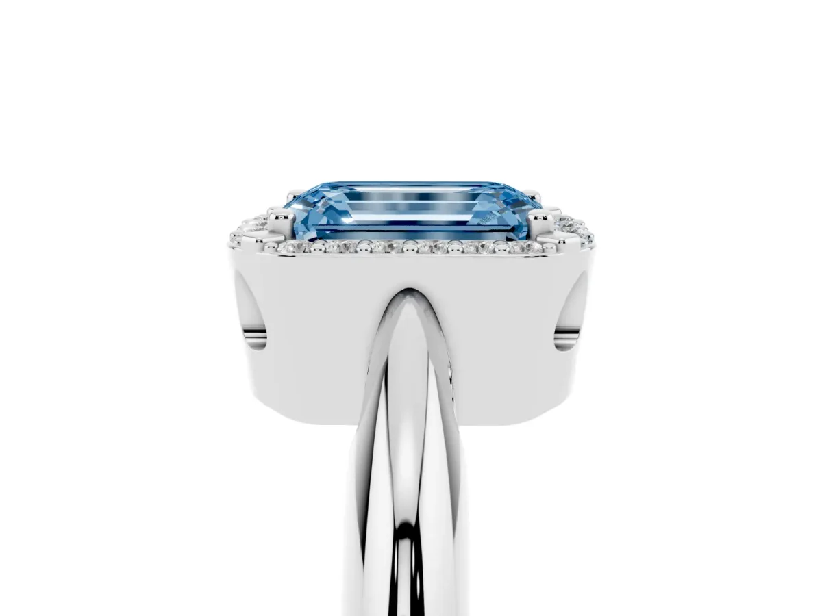 Fancy Blue Emerald Cut Cut Diamond Halo Engagement Ring with Split Shank and Four-Prong Setting Silver