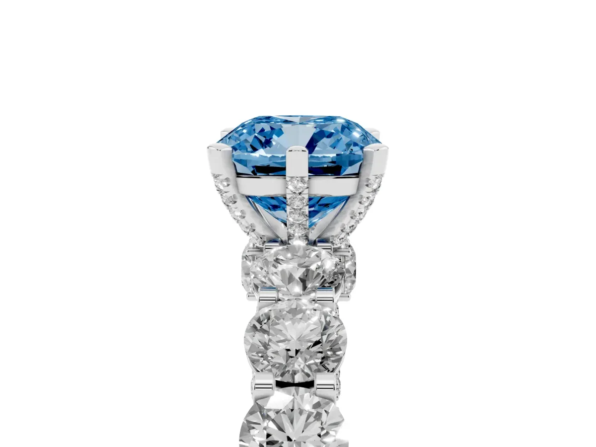 Fancy Blue Cushion Cut Diamond Side Stone Engagement Ring with Four-Prong Setting Platinum