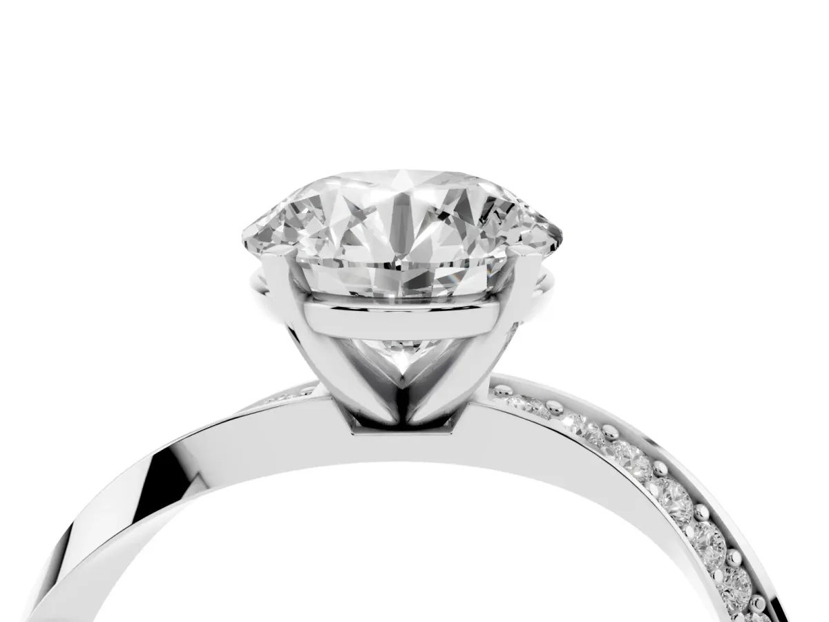 Round Cut Diamond Engagement Ring with Side Stone Accents and Four-Prong Setting Silver