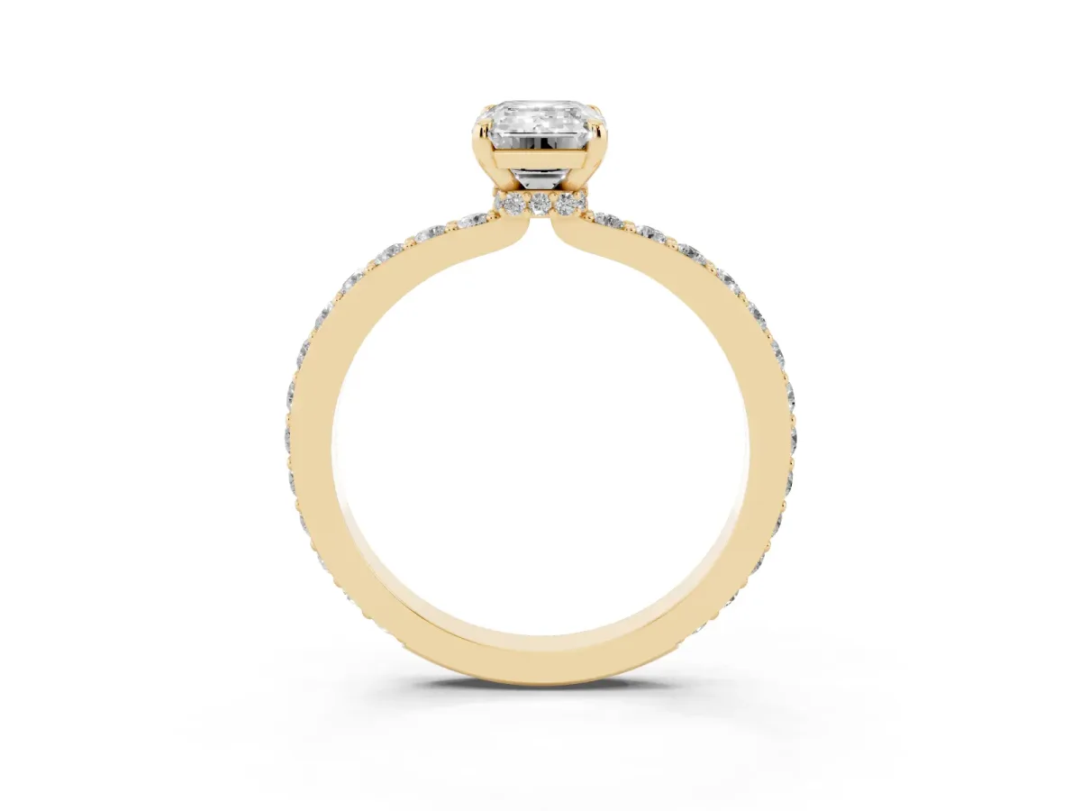 Emerald Cut Diamond Solitaire Engagement Ring with Pavé Band and Four-Prong Setting Yellow gold