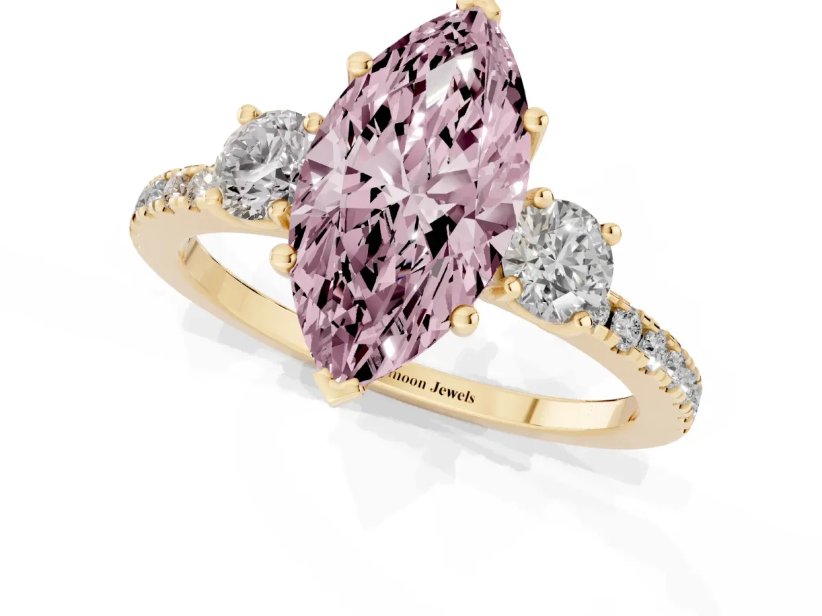 Fancy Pink Three-Stone Marquise Cut Cut Diamond Pavé Band with Prong Setting Yellow gold