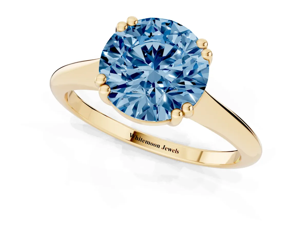 Fancy Blue Round Cut Solitaire Diamond Ring with Six-Prong Setting and Classic Band Yellow gold