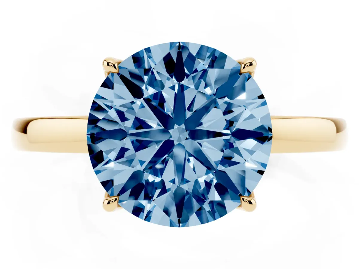 Fancy Blue Round Cut Diamond Solitaire Ring with Thin Band and Prong Setting Yellow gold