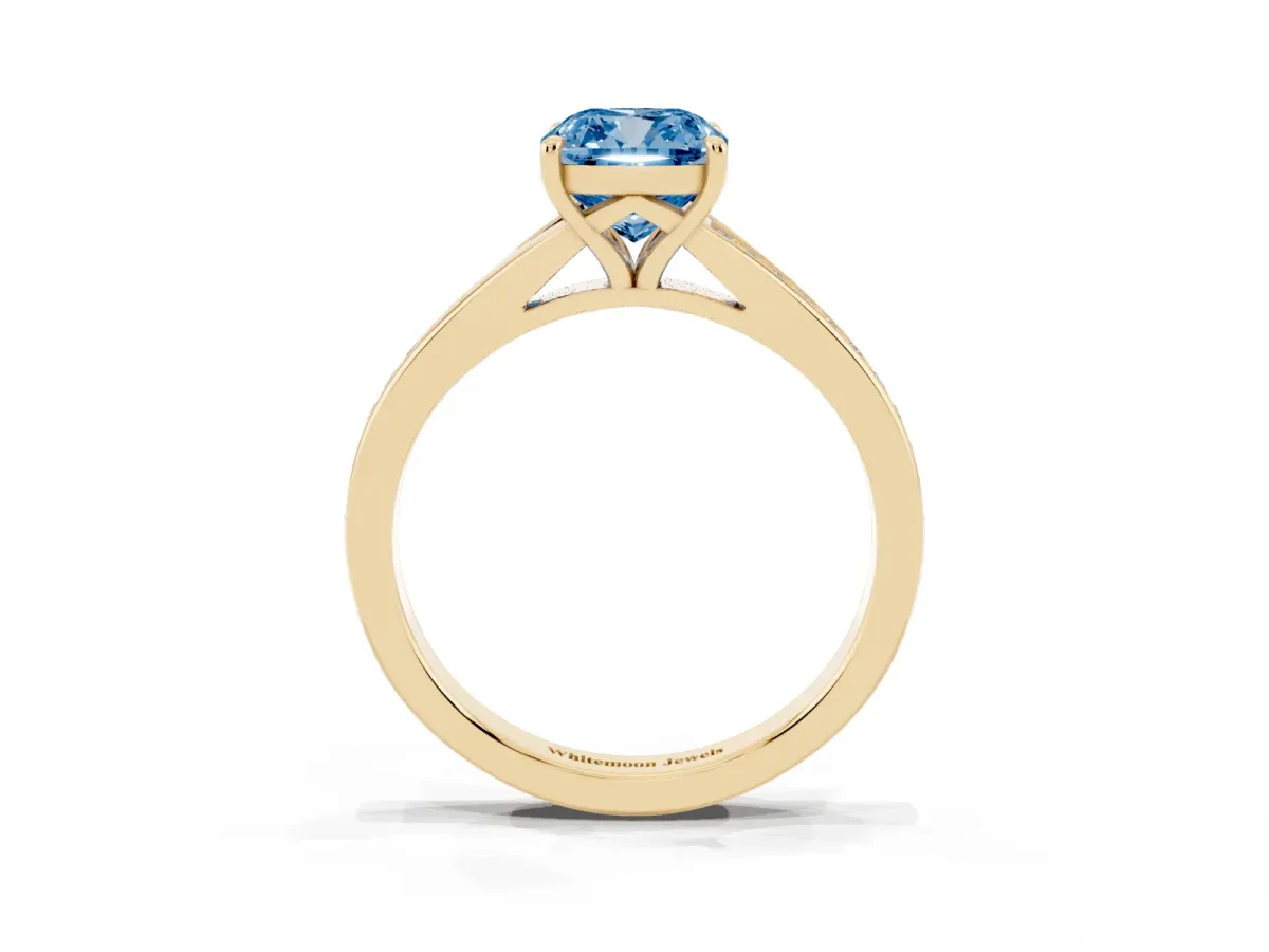 Fancy Blue Cushion Cut Diamond Solitaire Ring with Pavé Band and Prong Setting Yellow gold