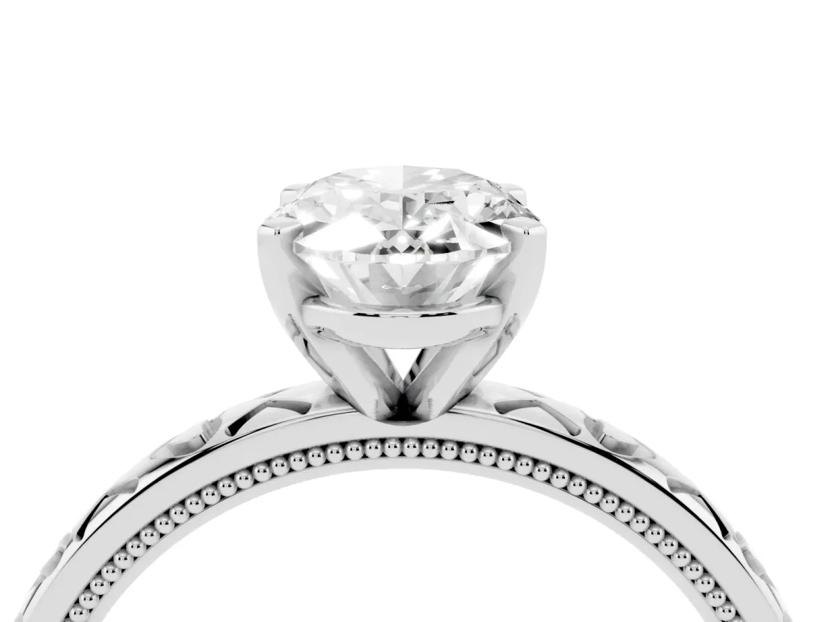 Oval Cut Solitaire Diamond Engagement Ring with XO Engraved Band and Four-Prong Setting Platinum