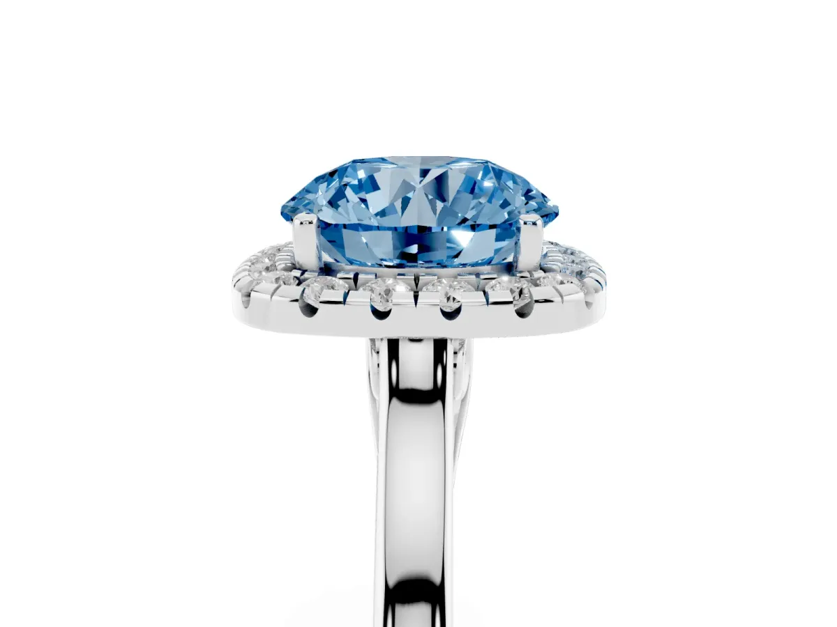 Fancy Blue Round Cut Halo Round Diamond Solitaire Ring with Pavé Band and Four-Prong Setting Silver