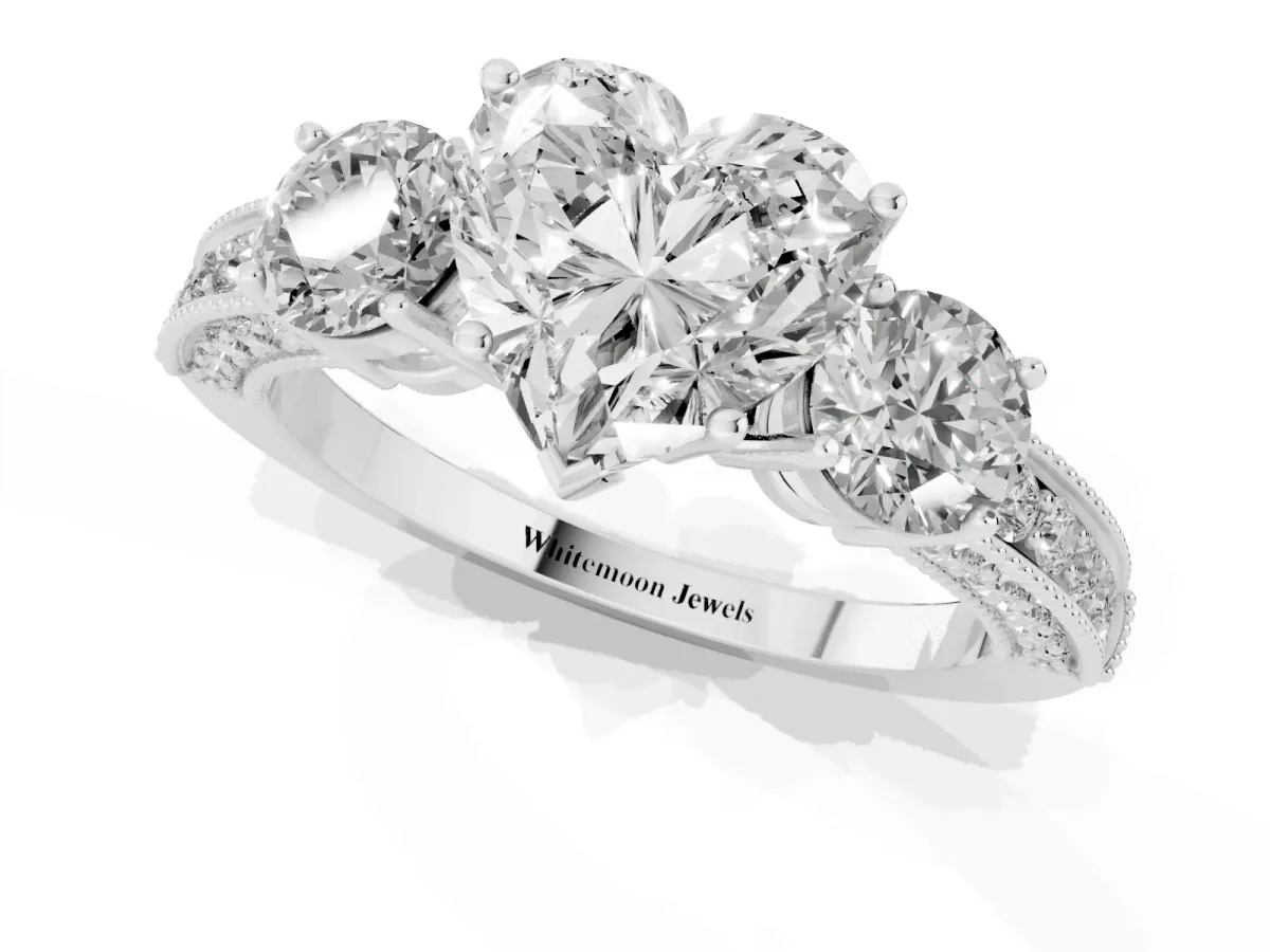 Heart Cut Three-Stone Diamond Ring with Pavé Band and Four-Prong Setting Silver