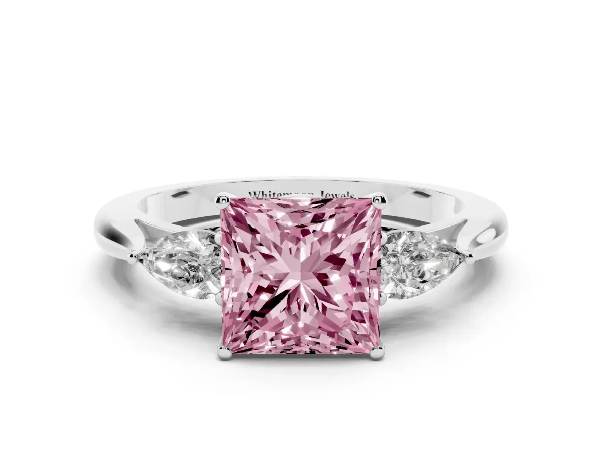 Fancy Pink Three-Stone Princess Cut Brilliant Diamond Solitaire Ring with Tapered Band and Four-Prong Setting White gold