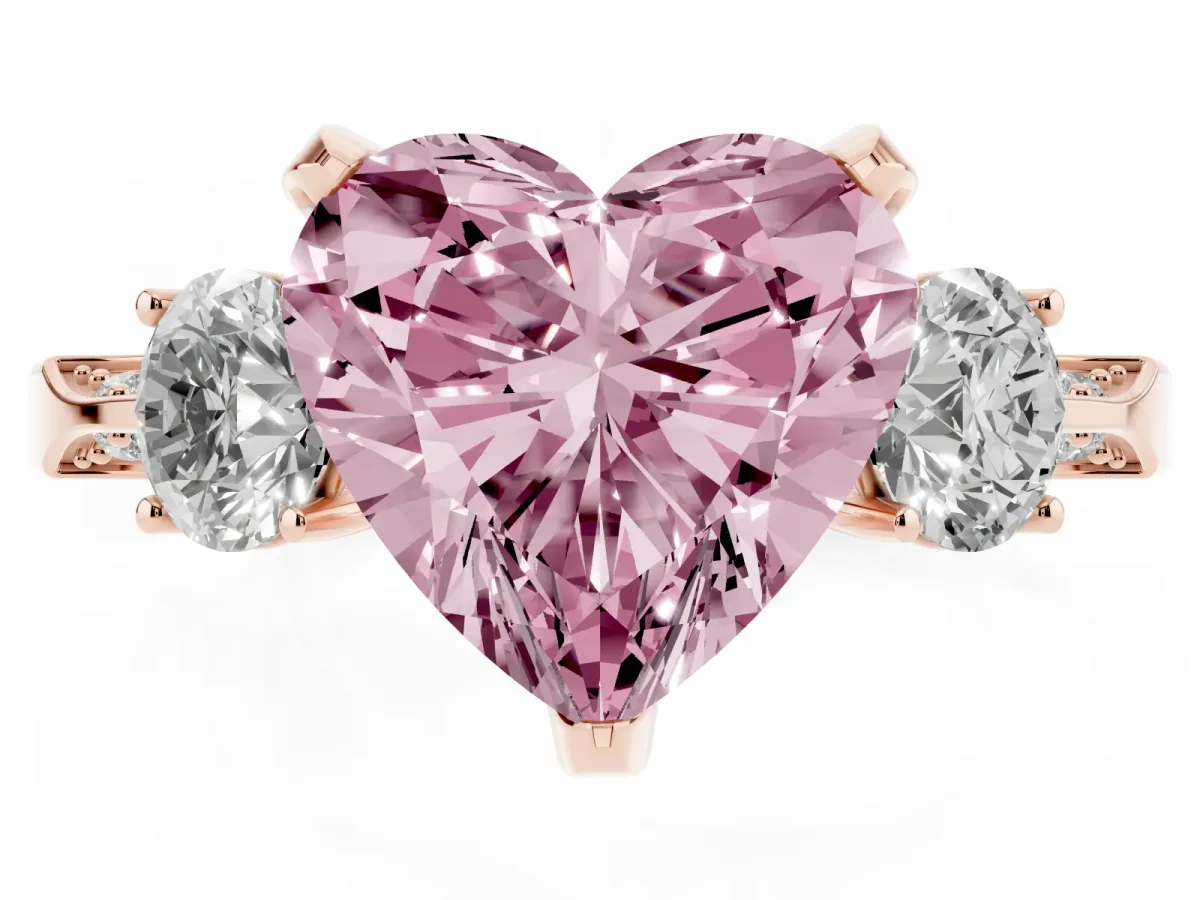 Fancy Pink Heart Cut Brilliant Three-Stone Diamond Ring with Pavé Band and Four-Prong Setting Rose gold