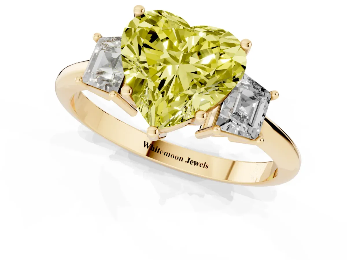 Fancy Yellow Heart Cut Diamond Three-Stone Ring with Trapezoid Side Stones and Prong Setting Yellow gold
