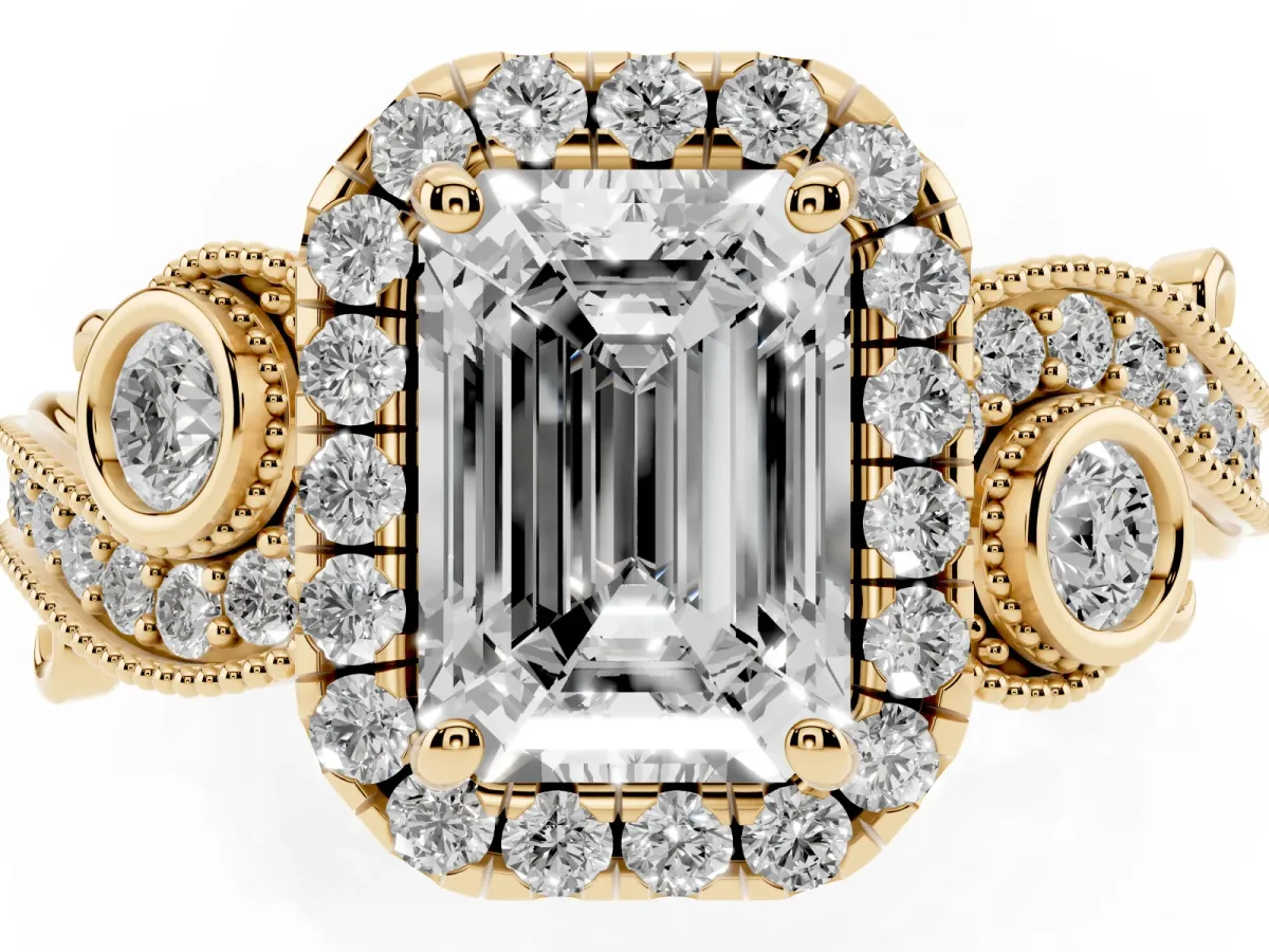 Emerald Cut Halo Diamond Ring with Milgrain and Bezel Accents on a Split Shank Band Yellow gold