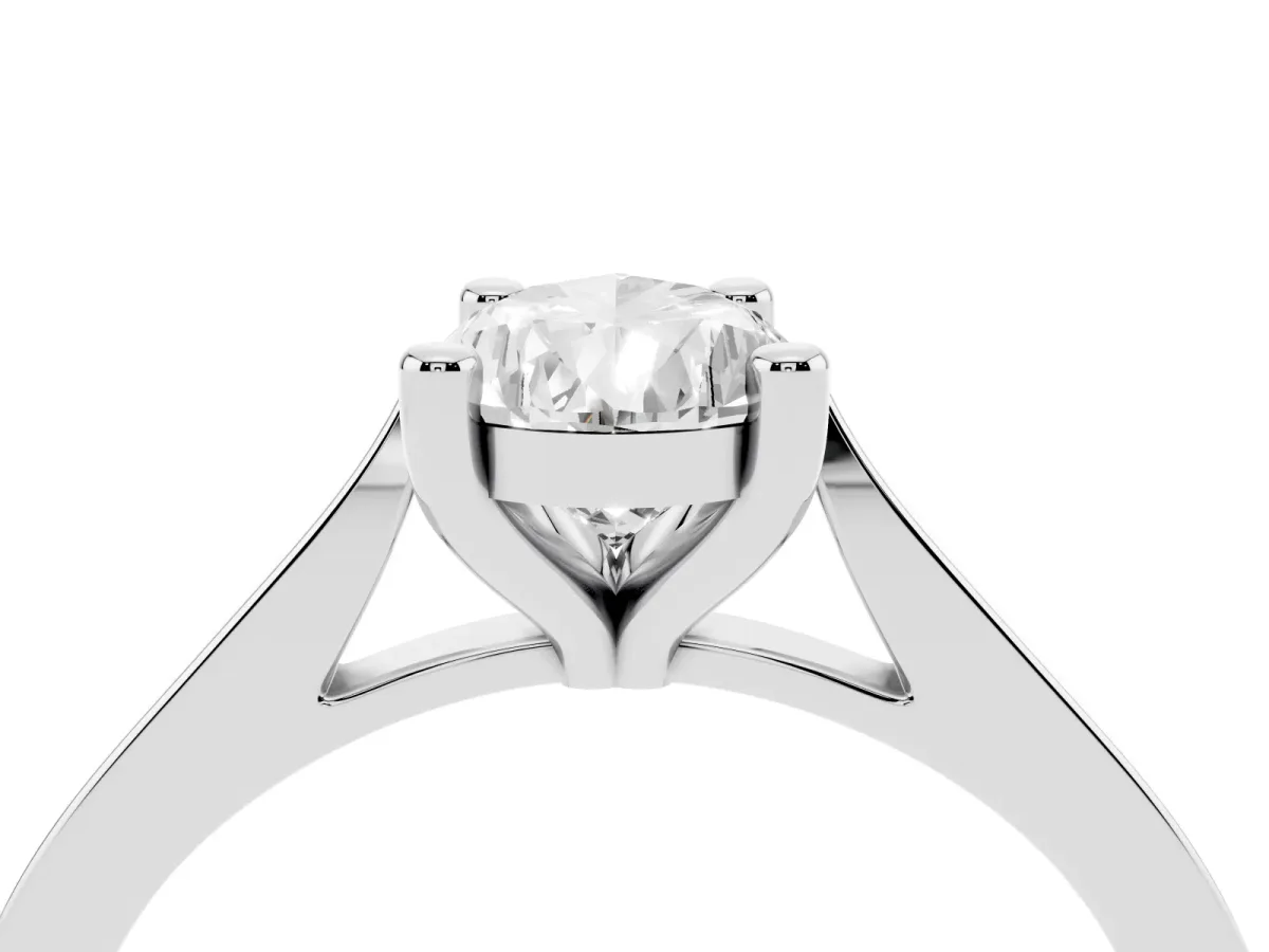 Pear Cut Solitaire Diamond Ring with Four-Prong Setting and Tapered Band Platinum
