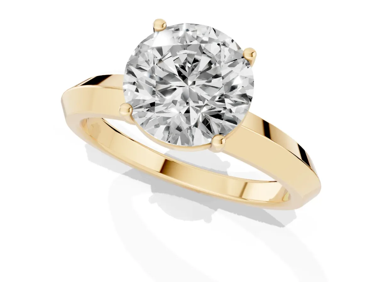 Round Cut Cut Solitaire Engagement Ring with Flat Band and Four-Prong Setting Yellow gold