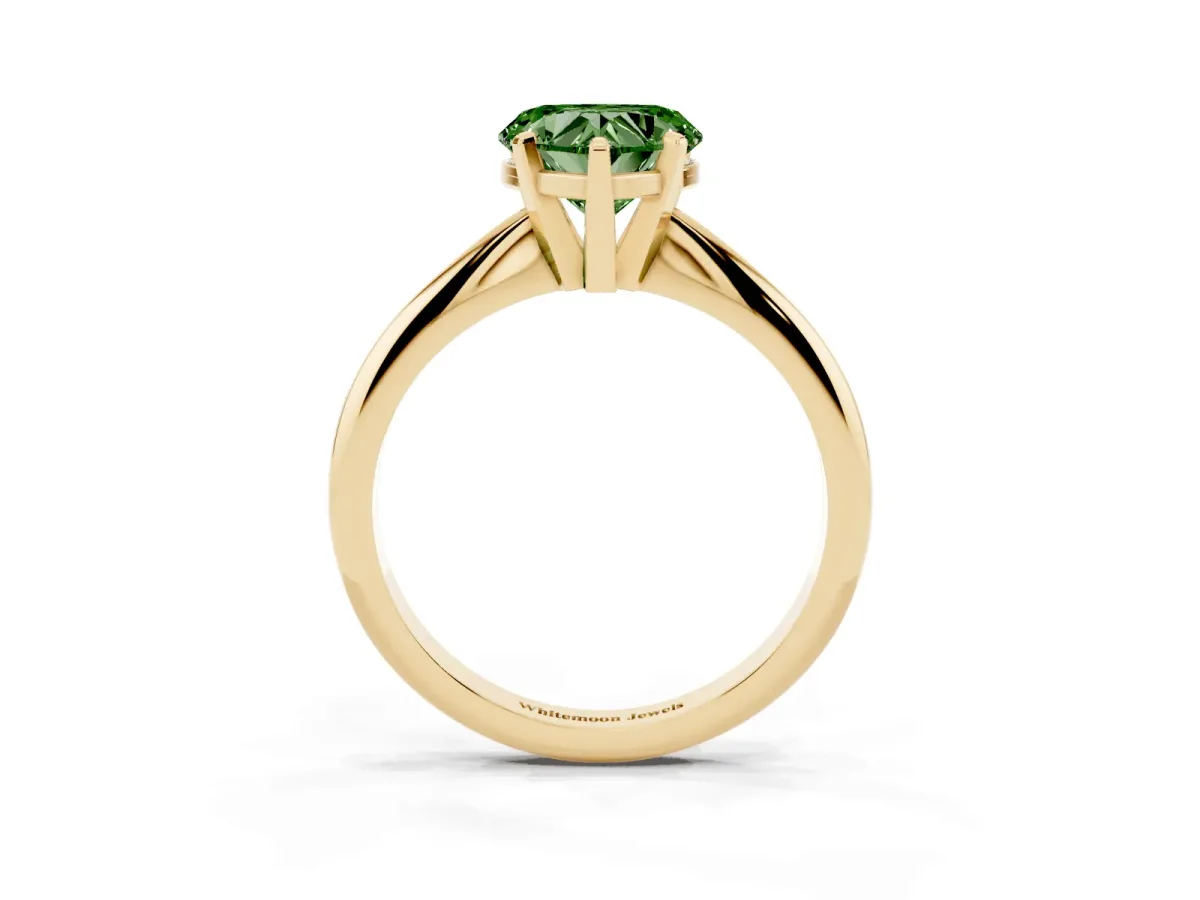 Fancy Green Heart Cut Cut Solitaire Ring with Four-Prong Setting on a Classic Band Yellow gold