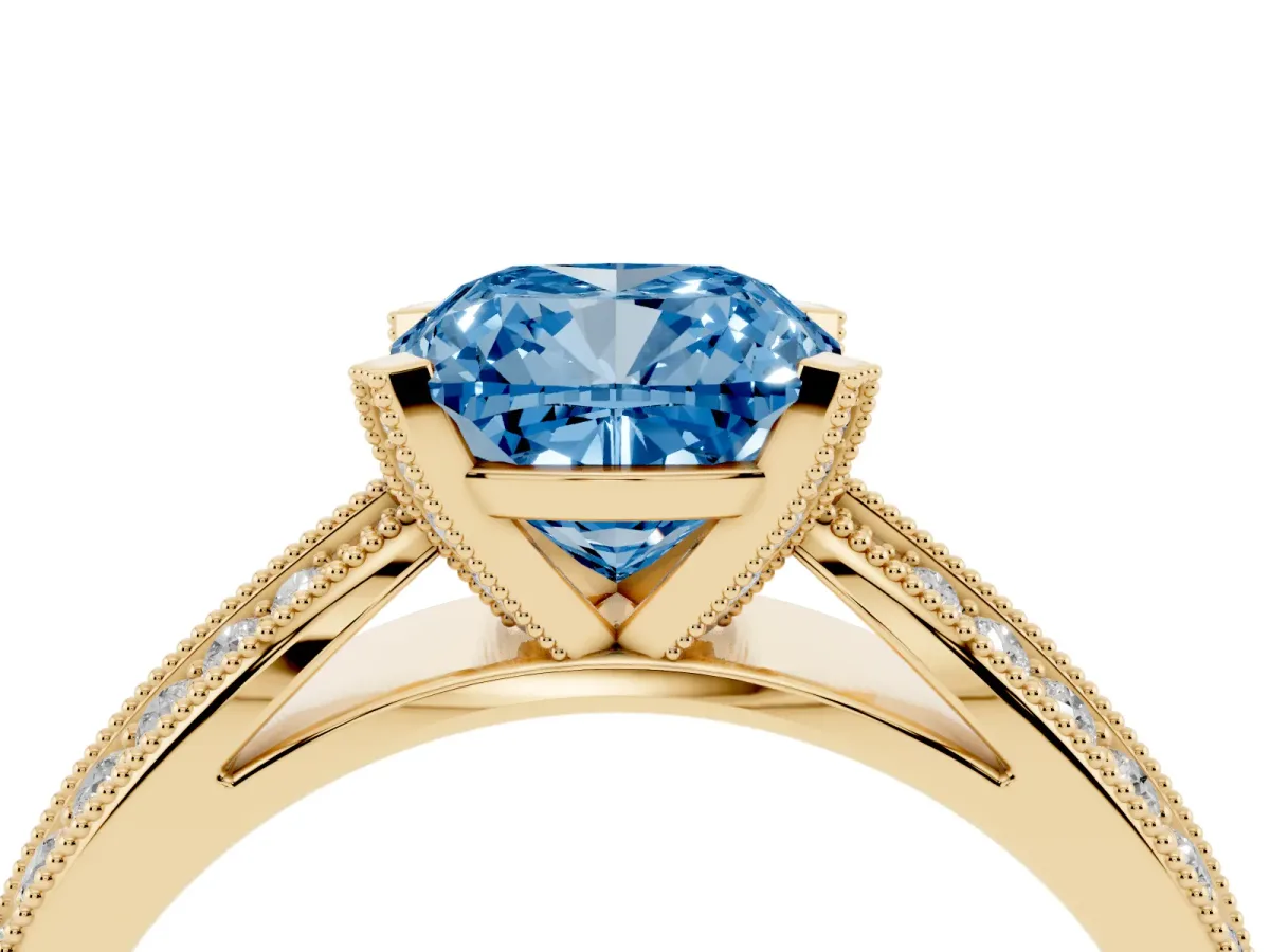 Fancy Blue Cushion Cut Diamond Solitaire Ring with Milgrain Round Pavé Band and Prong Setting Yellow gold