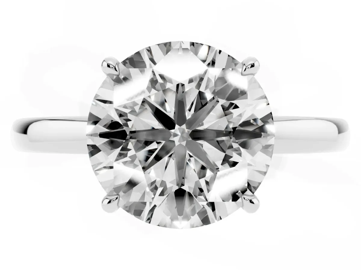 Round Cut Solitaire Engagement Ring with Cathedral Band and Four-Prong Setting Silver
