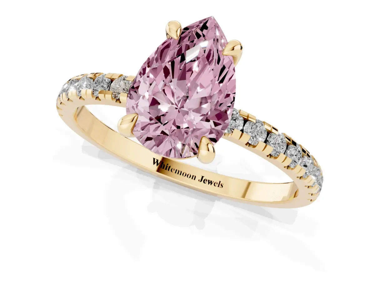 Fancy Pink Pear Cut Diamond Brilliant Solitaire Ring with Pavé Band and Four-Prong Setting Yellow gold