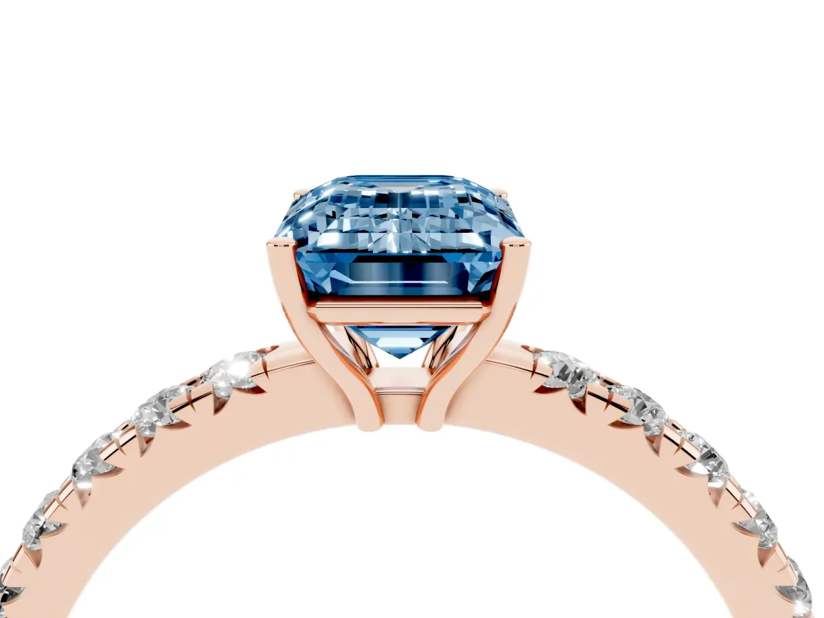 Fancy Blue Emerald Cut Diamond Pavé Solitaire Engagement Ring with Four-Prong Setting Rose gold